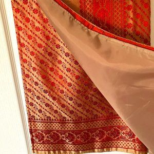 Pure silk saree in tan and red colors